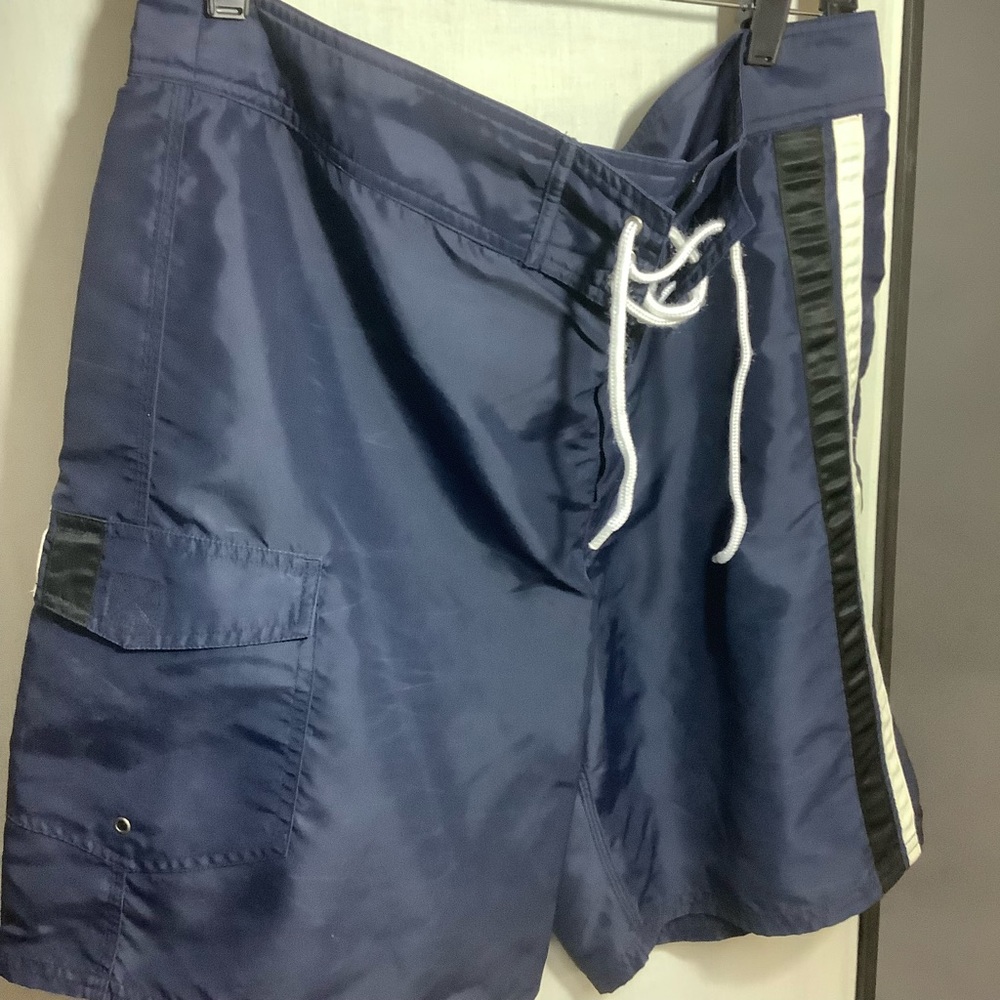 Mens swimwear North Coast  Blue trunks, Size 34 white stripe on side. Pocket